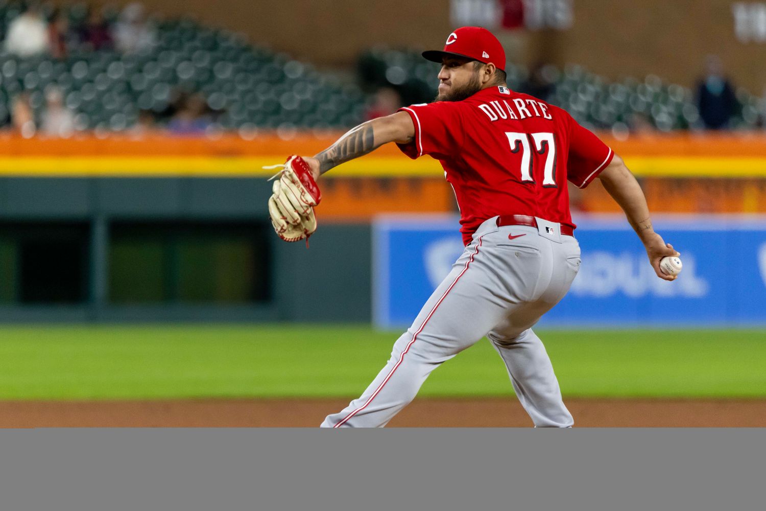 Sep 13, 2023; Detroit, Michigan, USA; Cincinnati Reds relief pitcher Daniel Duarte (77) throws in the eighth inning against the Detroit Tigers at Comerica Park.